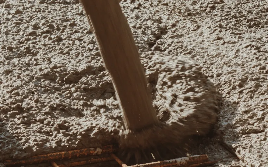 Pump line laying mud across a reinforced pad